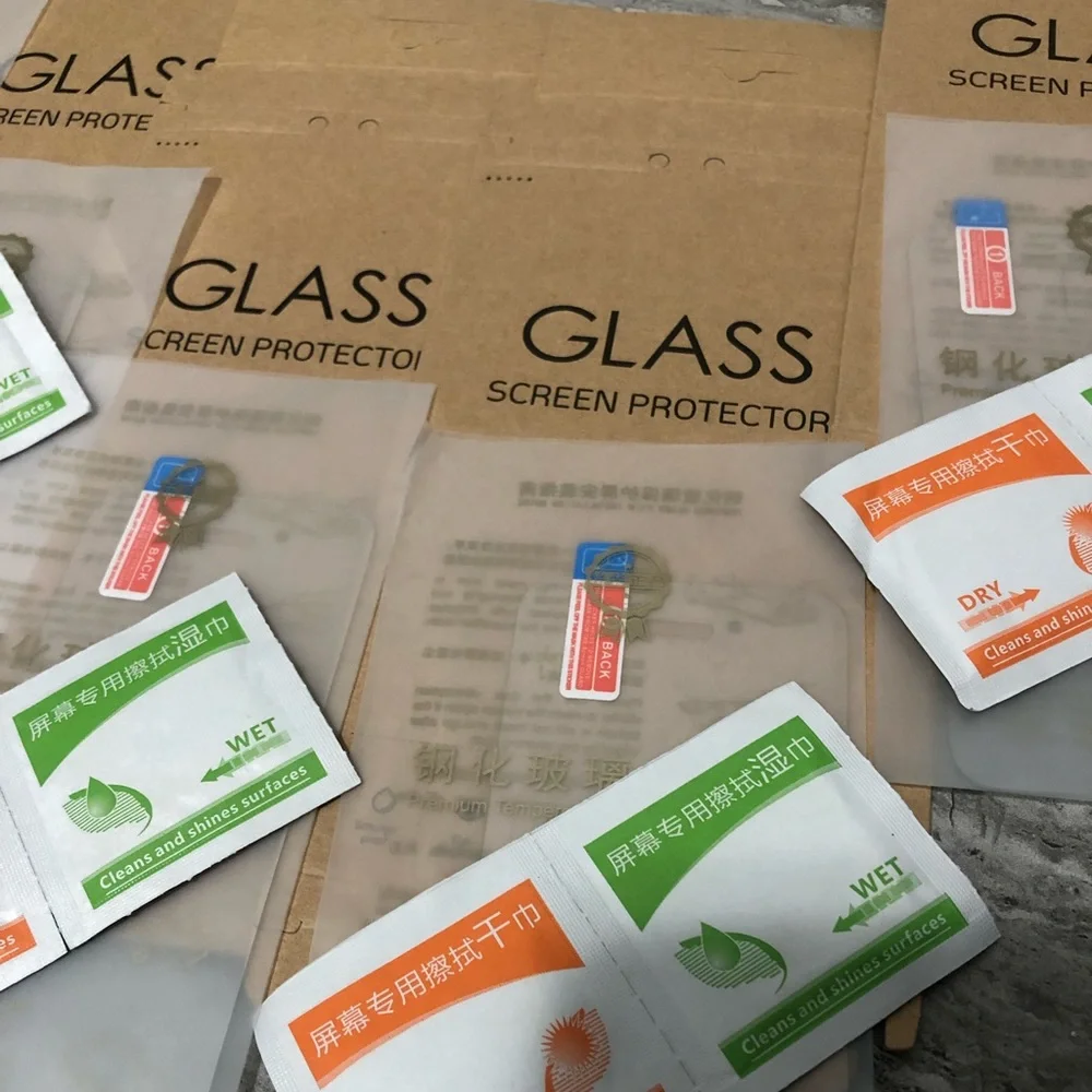 Six pack of iPhone 5s glass screen protectors with wipes to clean phone & screen